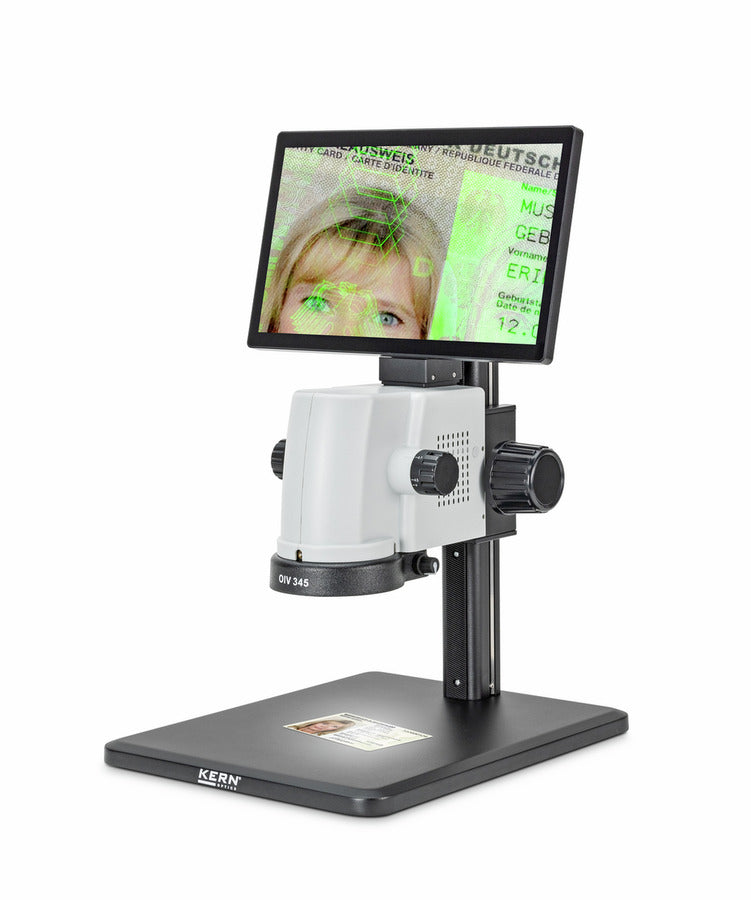 Digital microscope inspecting ID card with live image on display