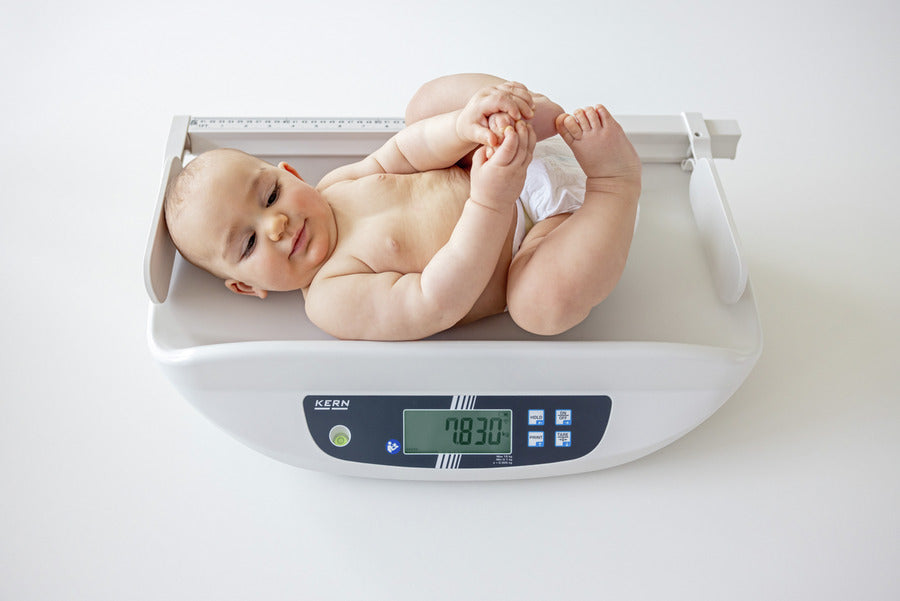baby scale with baby on