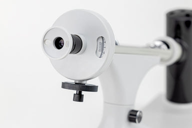 Manual polarimeter eyepiece and scale adjustment knob.